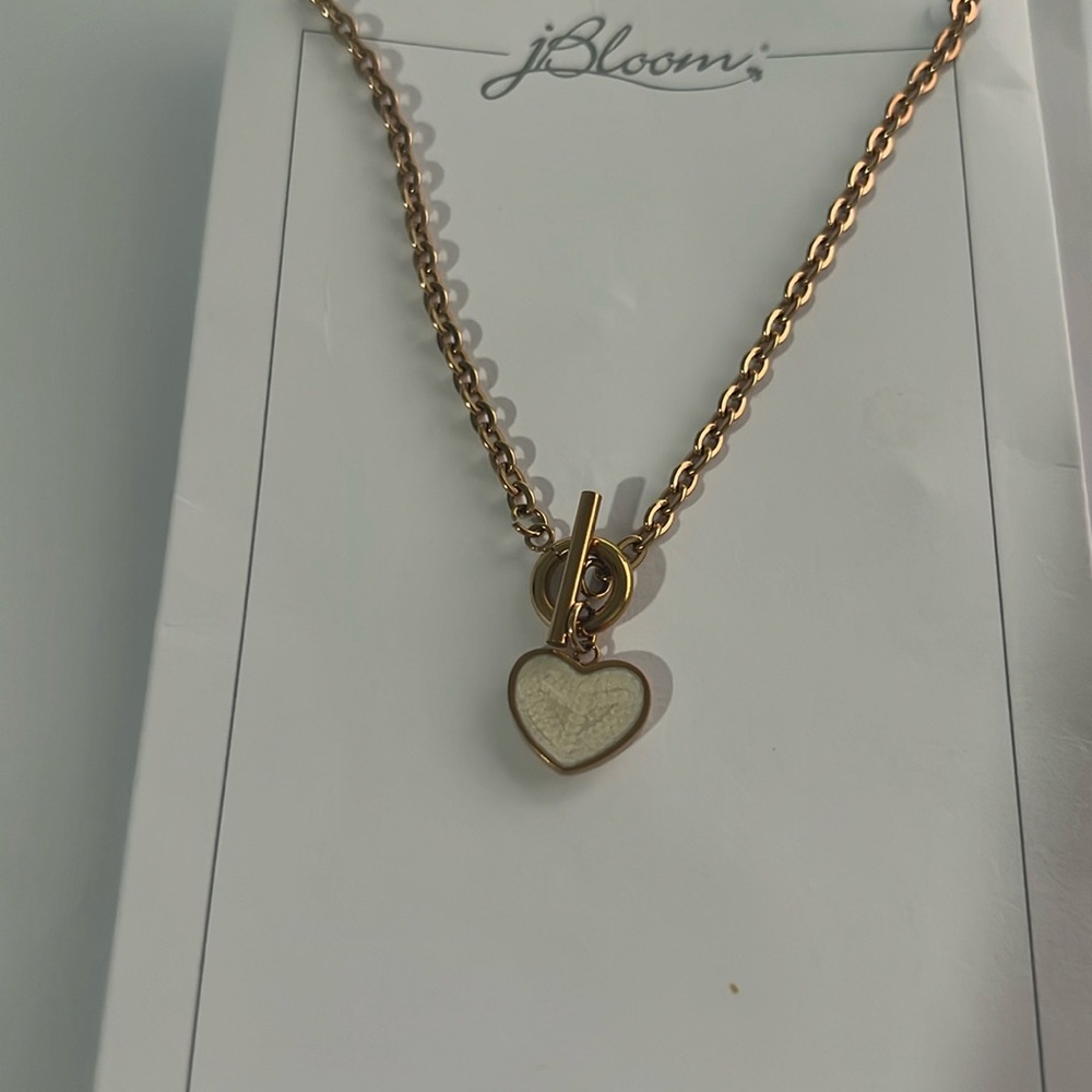 Heart necklace on gold